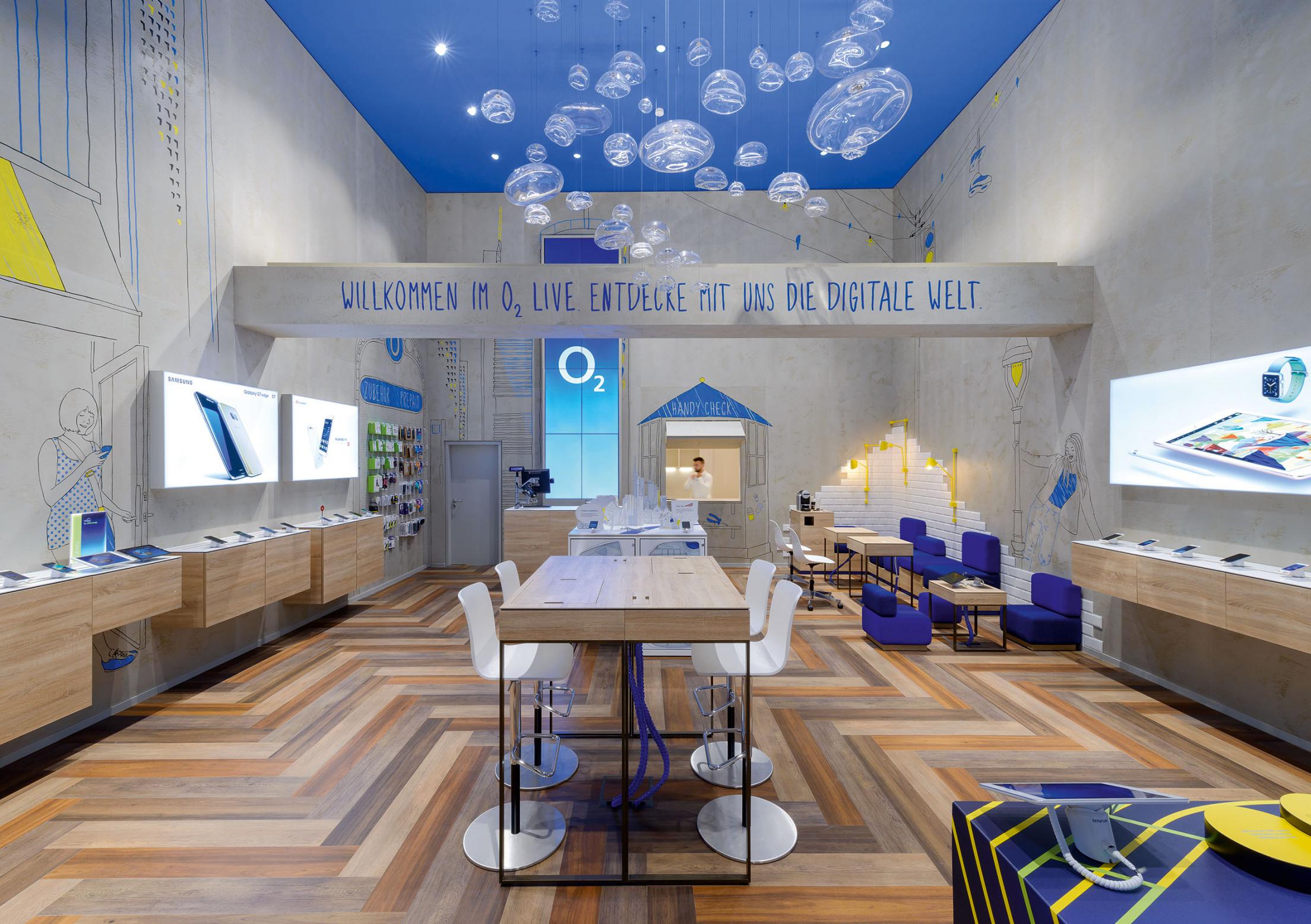 普陀區(qū)90平藍白色調(diào)手機營業(yè)廳辦公室裝修設(shè)計-第3張圖片-上海古都建筑設(shè)計集團